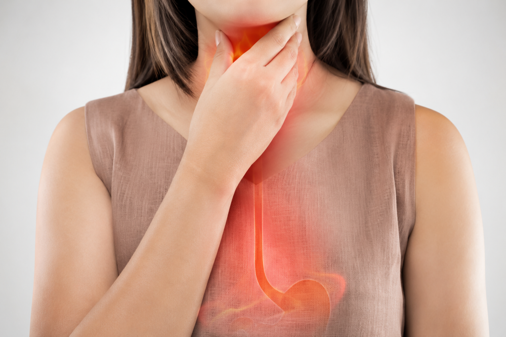 Symptoms and treatment options with a patient experiencing acid reflux and heartburn.