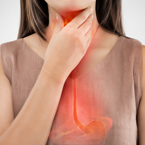 Symptoms and treatment options with a patient experiencing acid reflux and heartburn.